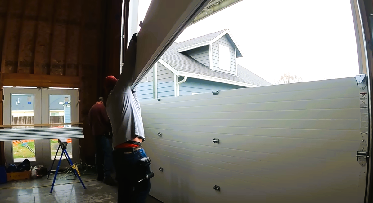 Newly installed modern garage door at a residential property in Bradenton, FL, highlighting sleek design, security features, and quality craftsmanship—perfect for garage door installation services