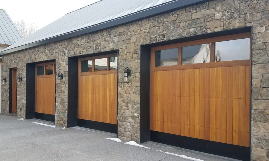Custom garage door with modern design installed in a residential home in Bradenton, FL by professional garage door services.